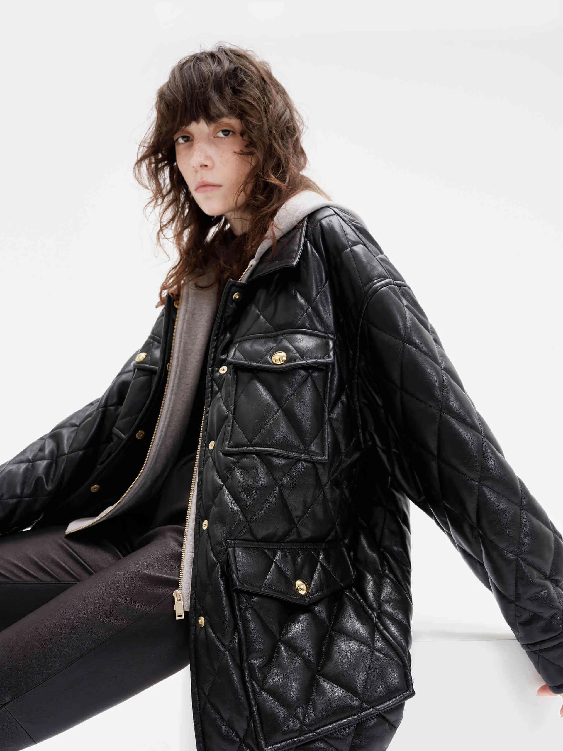 Layered PU Leather Quilted Jacket